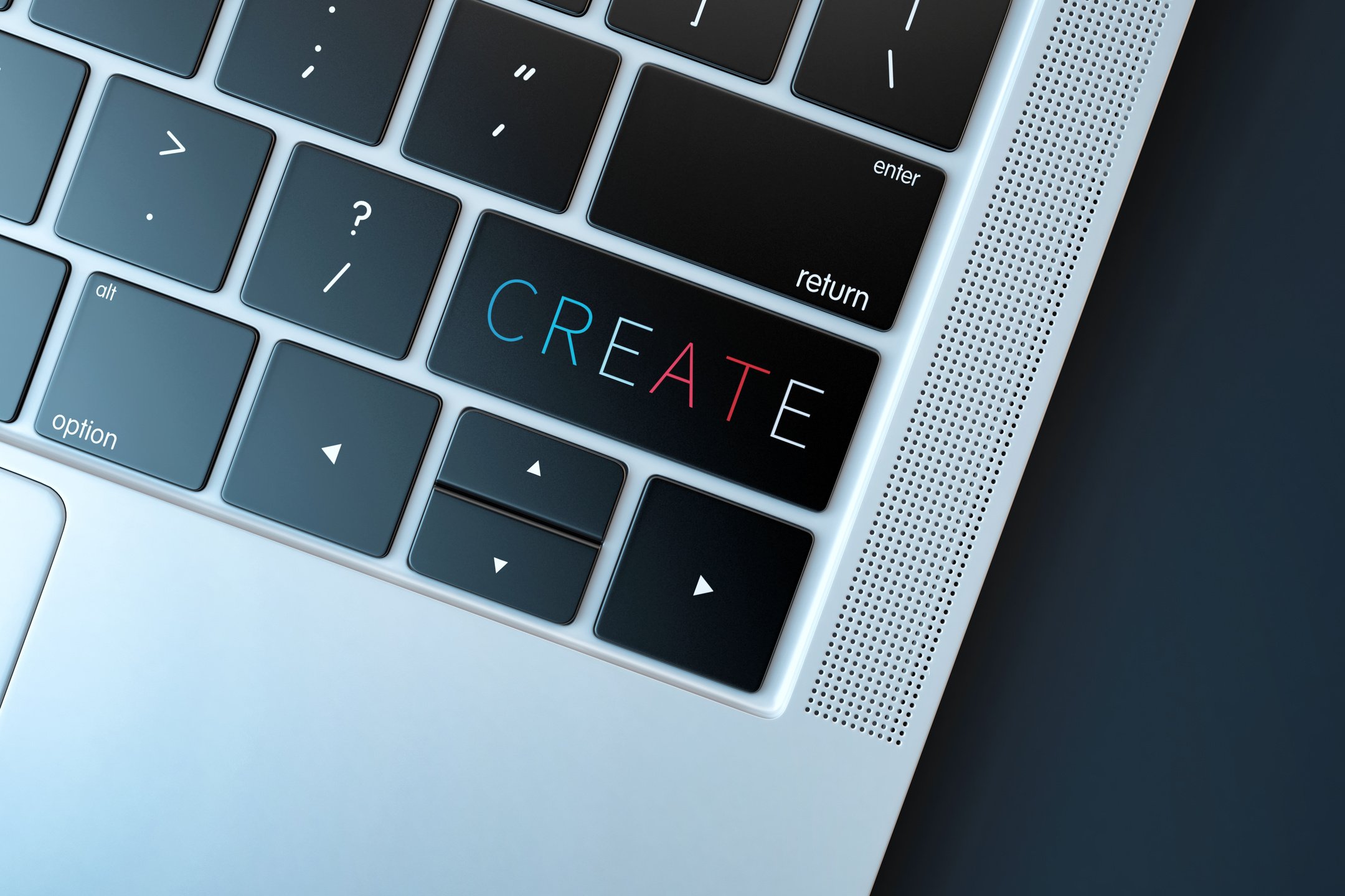 Keyboard Detail Of A Laptop That Says Create